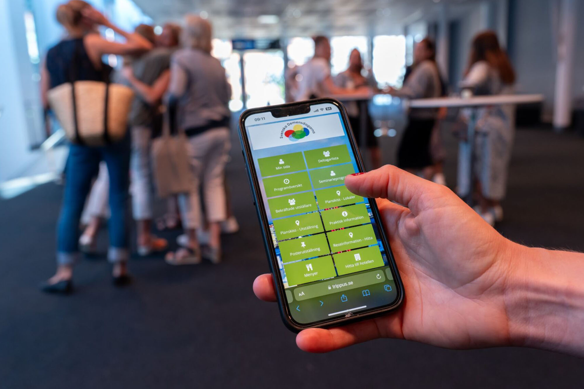 Mobil med öppen eventapp